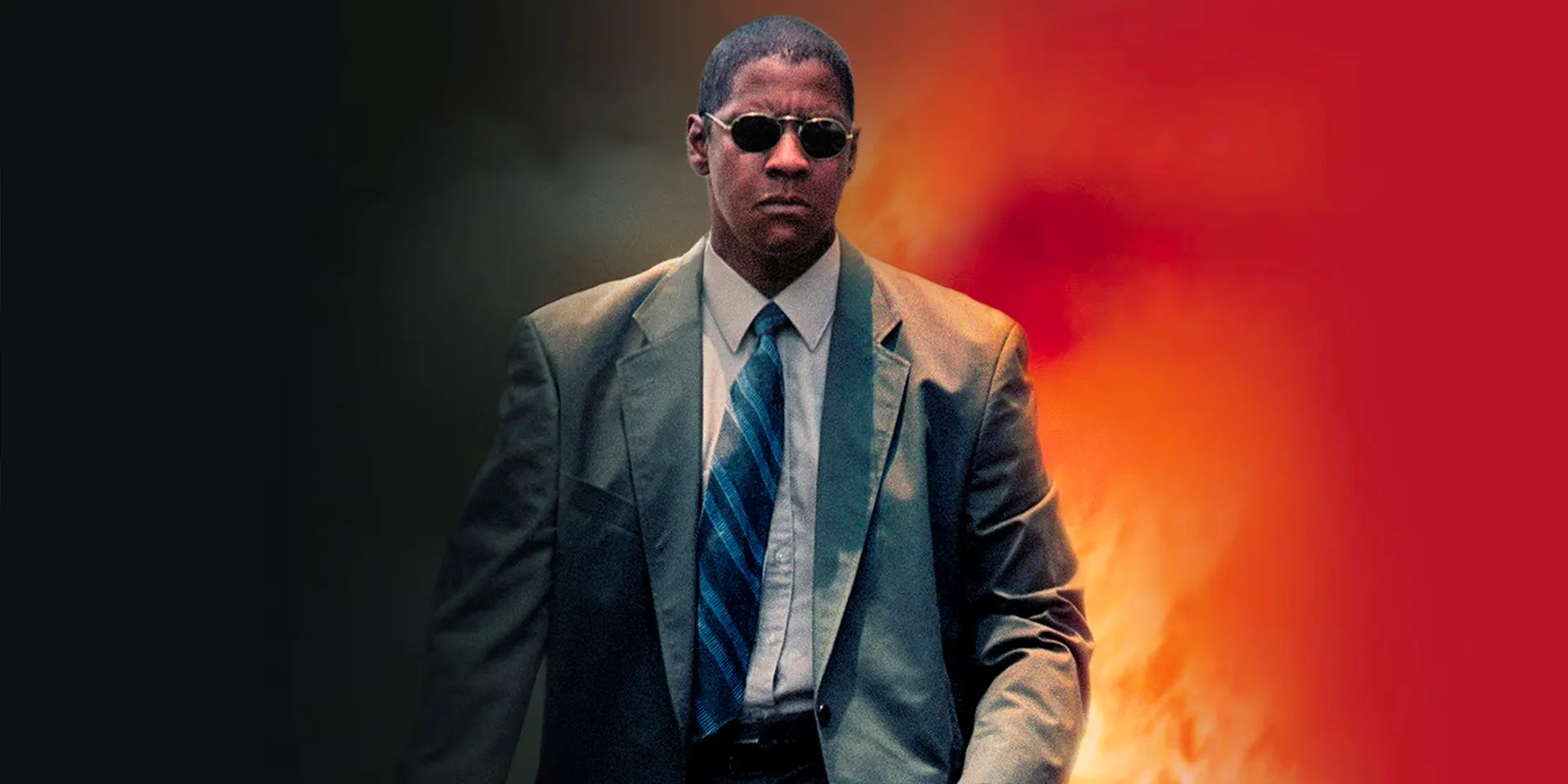 Denzel Washington as John Creasy with fire behind him in the poster for Man on Fire Image