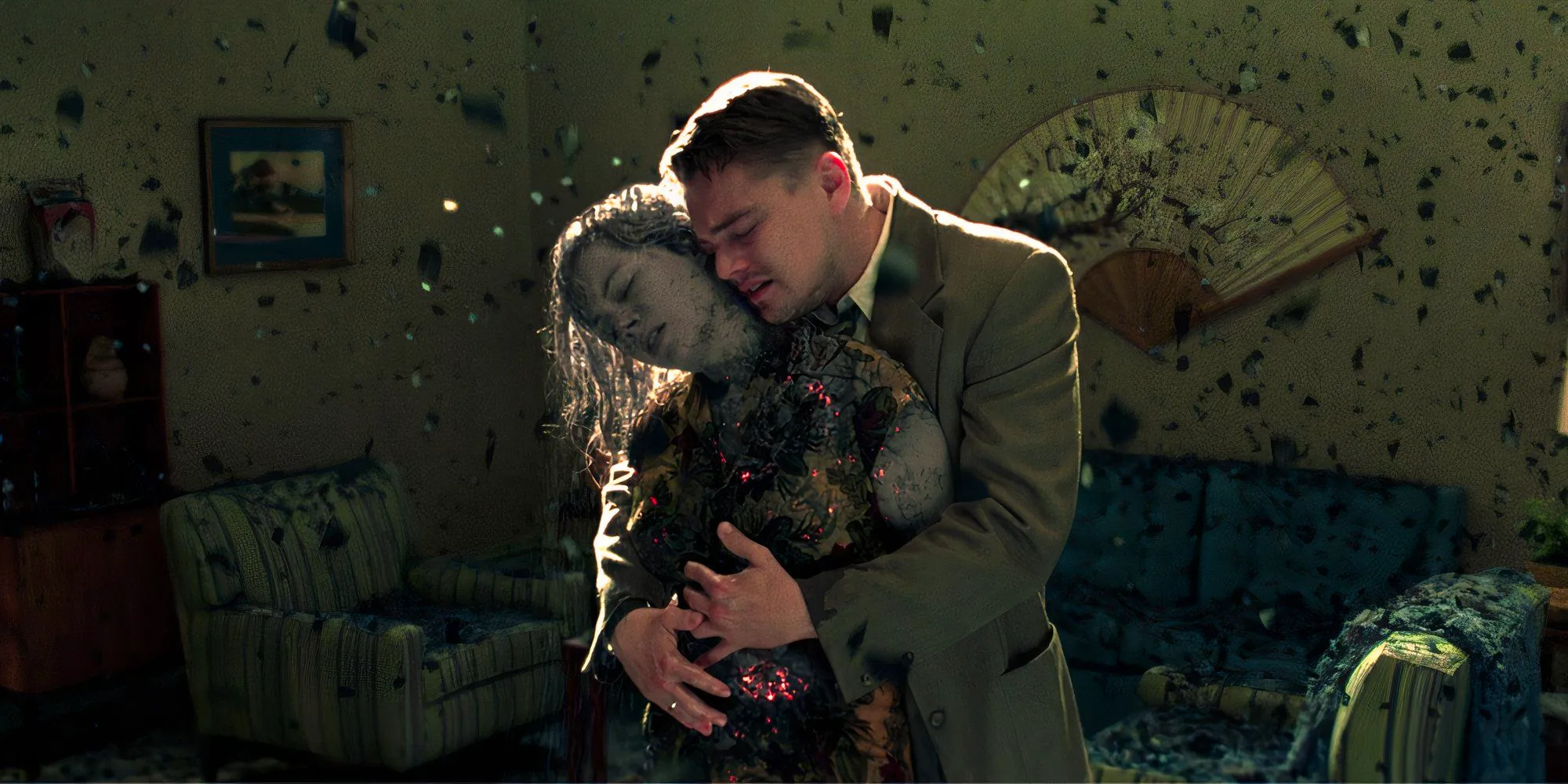 Dolores turns to ash in Teddy's arms in Shutter Island Image