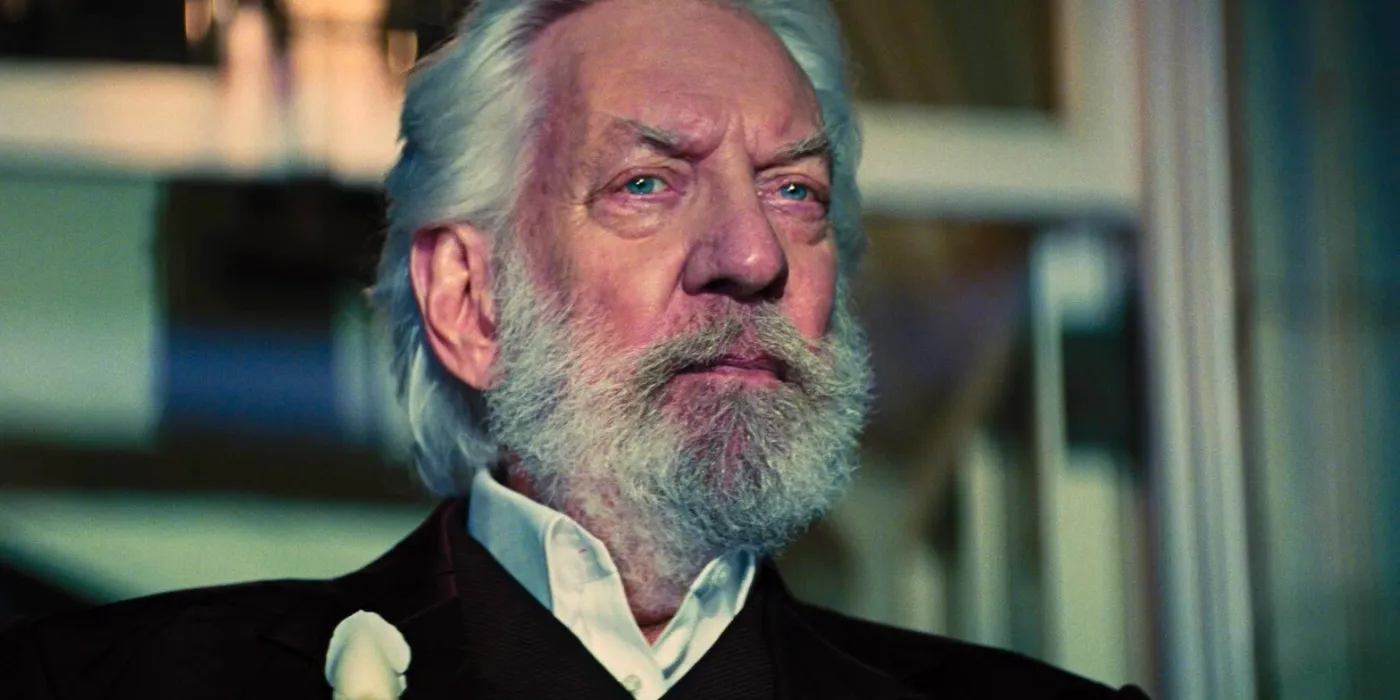 Donald Sutherland's President Coriolanus Snow at a Capitol party in The Hunger Games: Catching Fire Image