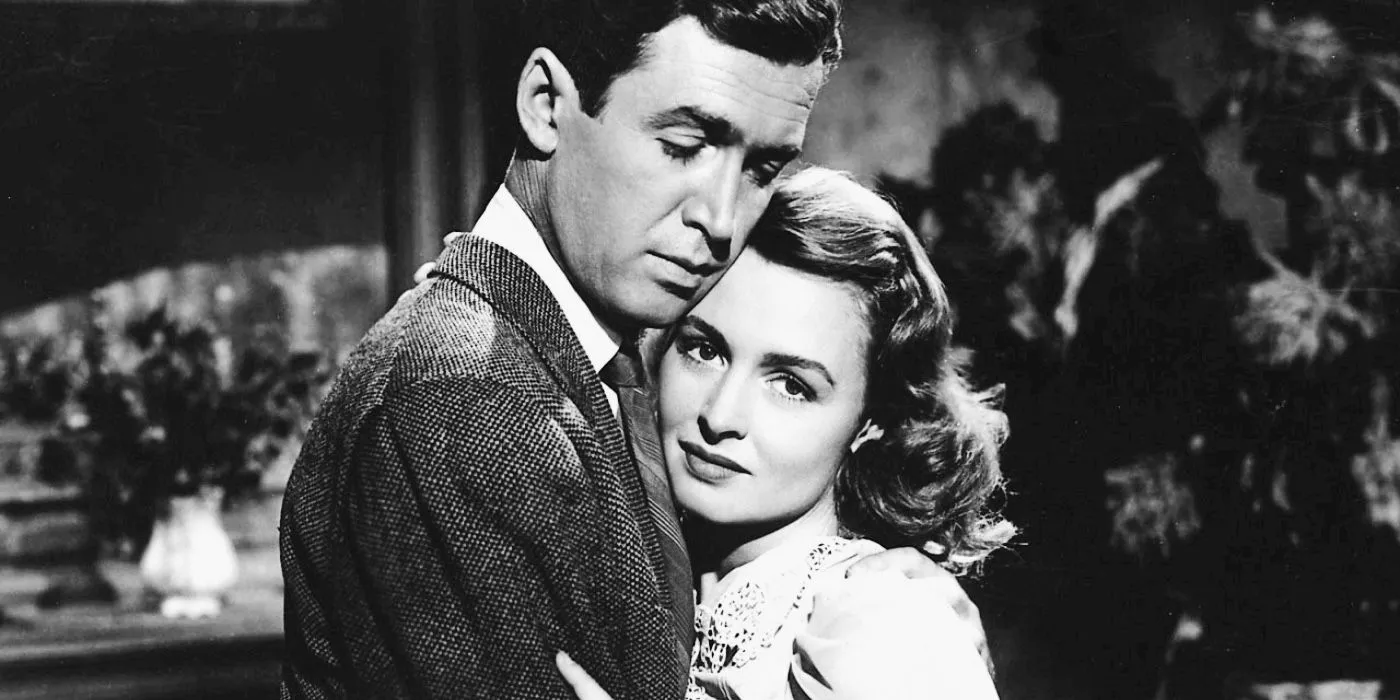 Donna Reed as Mary and James Stewart as George Hugging in It's a Wonderful Life Image