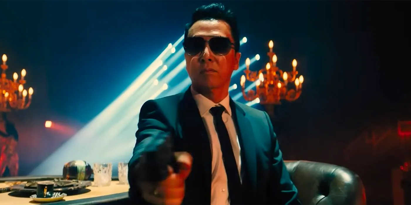 Donnie Yen points a gun in John Wick Chapter 4 Image