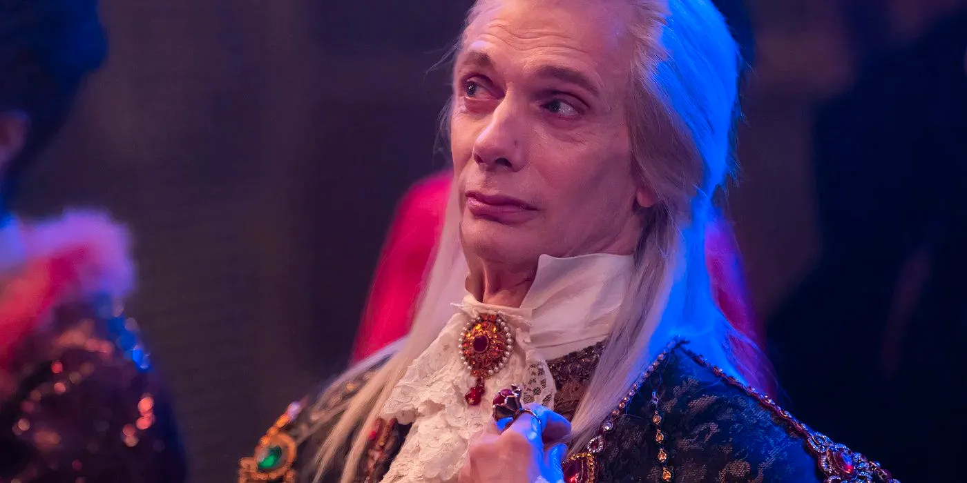 Doug Jones as Baron Afanas looks mildly perturbed at the vampire club in What We Do in the Shadows Image