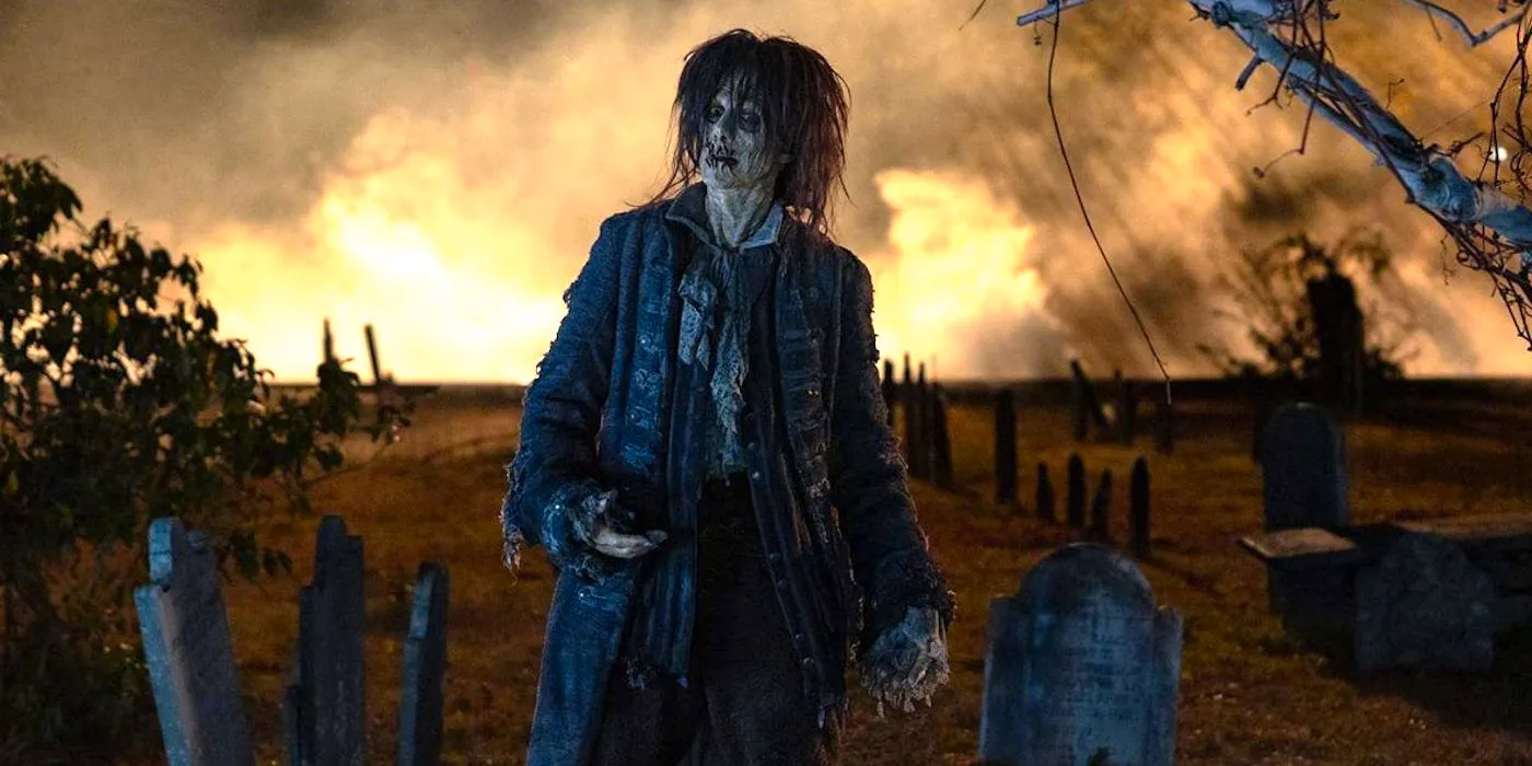 Doug Jones as Billy Butcherson in a graveyard in Hocus Pocus 2 Image