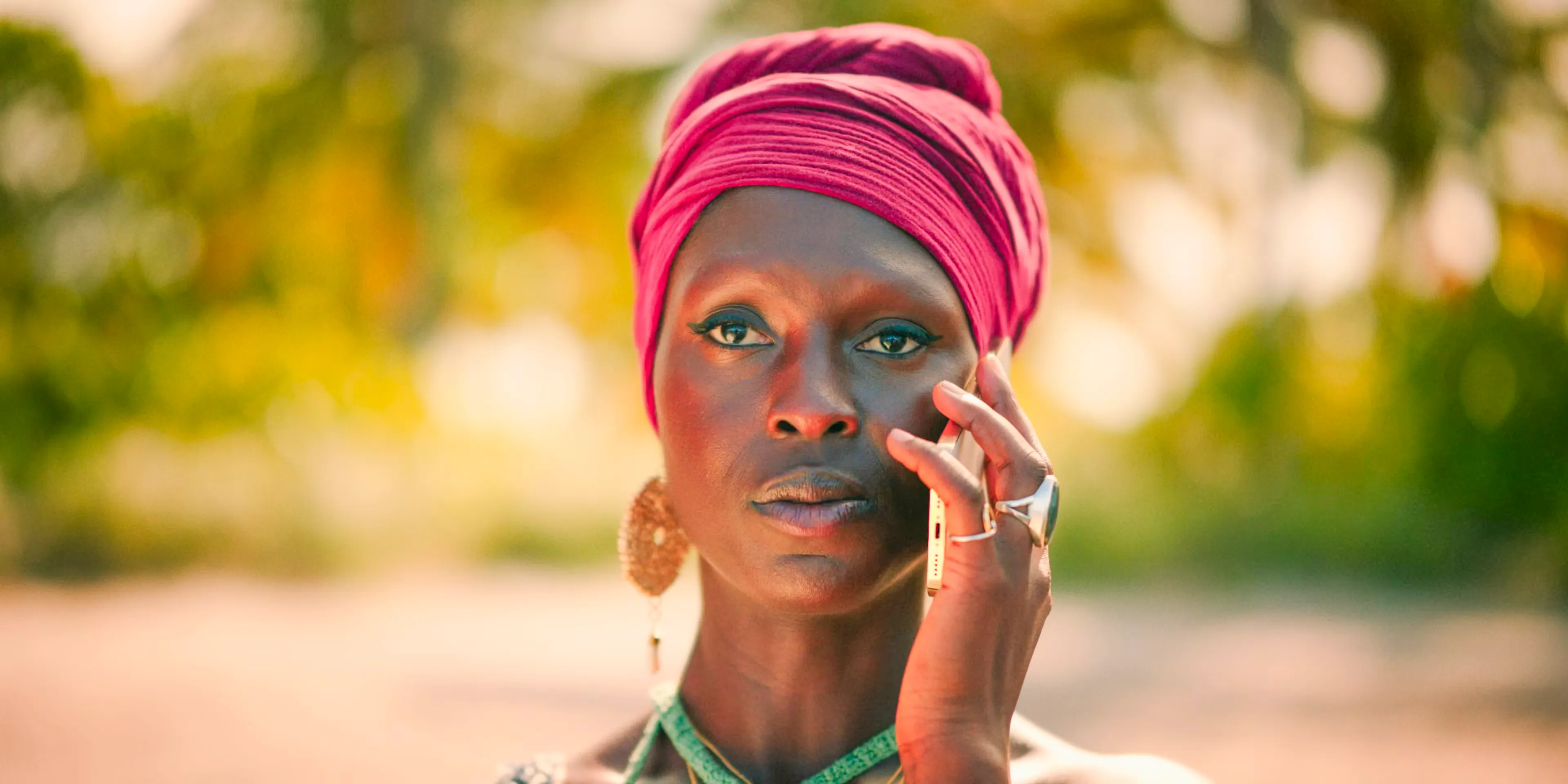 Dragon Queen (Jodie Turner-Smith) making a phone call to Eve in Bad Monkey Season 1 Episode 7 Image