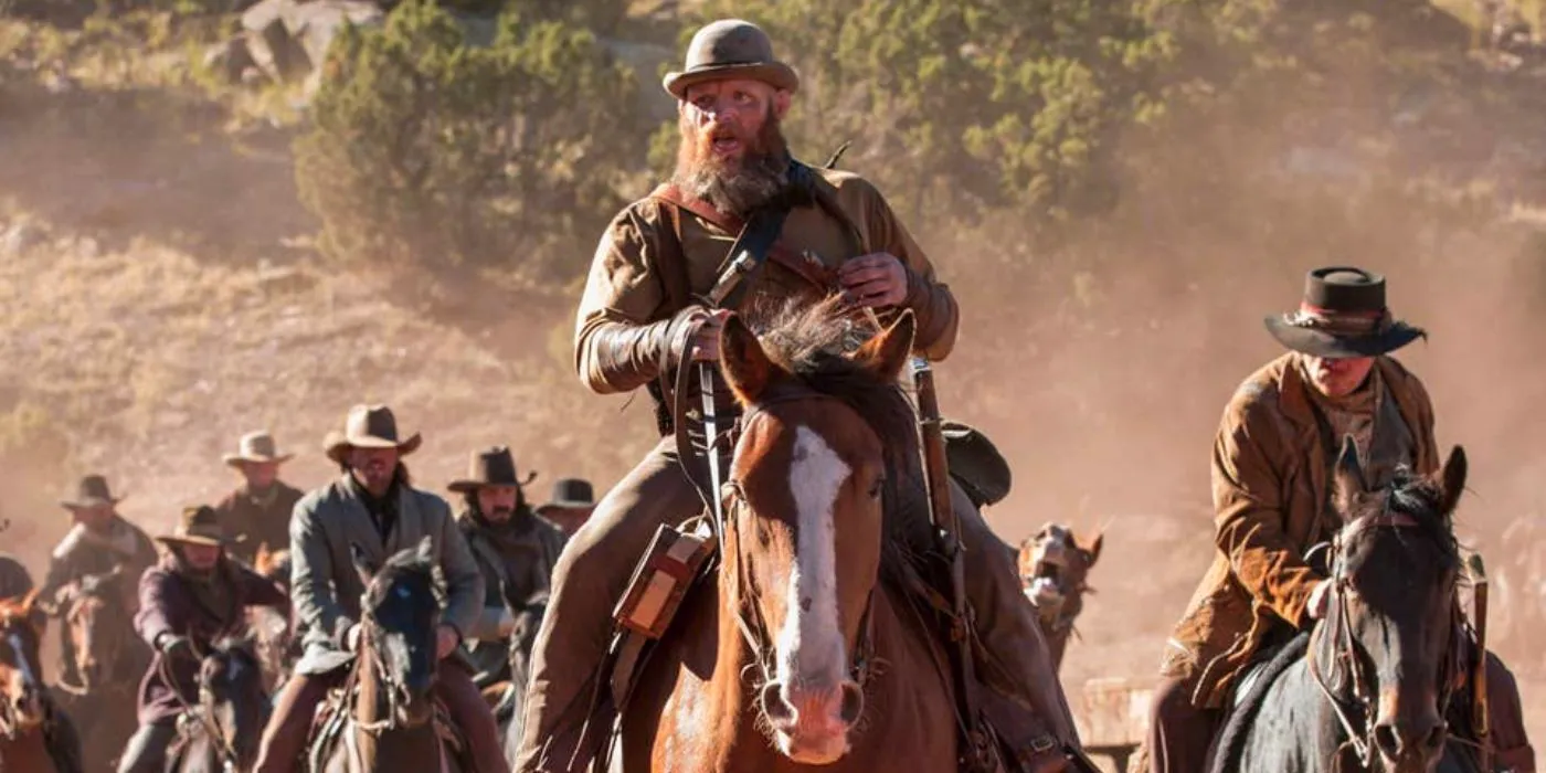 Dwyer Howe and others riding horses in Godless Image