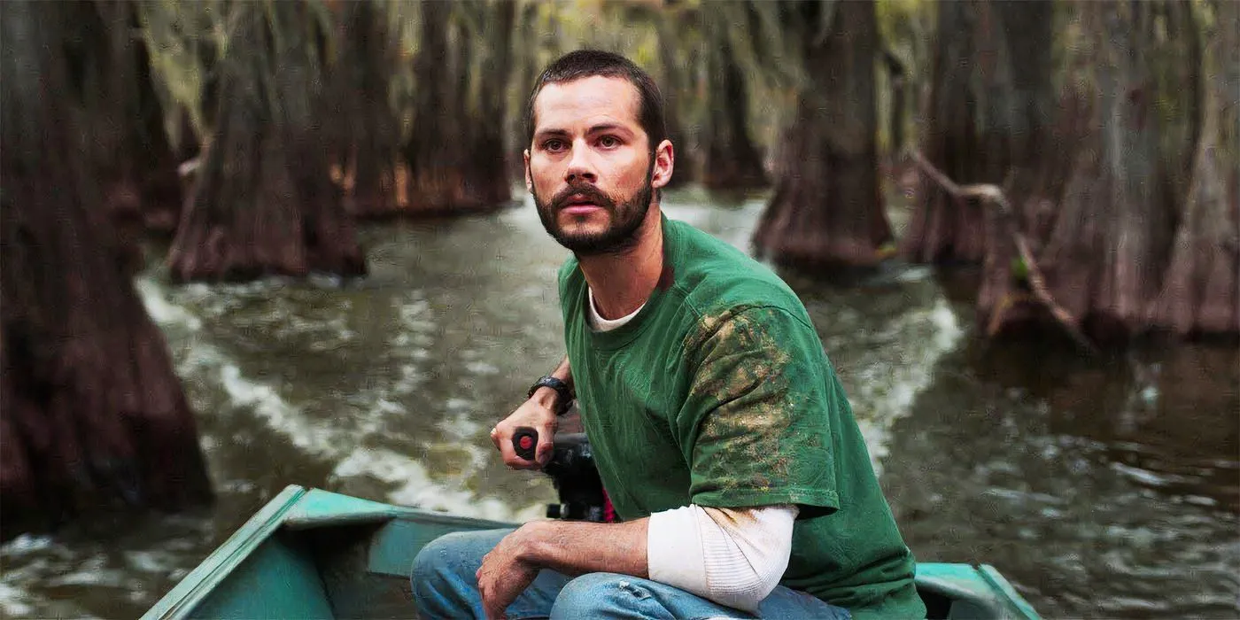 Dylan O'Brien in a still from Caddo Lake where he is controlling his boat Image