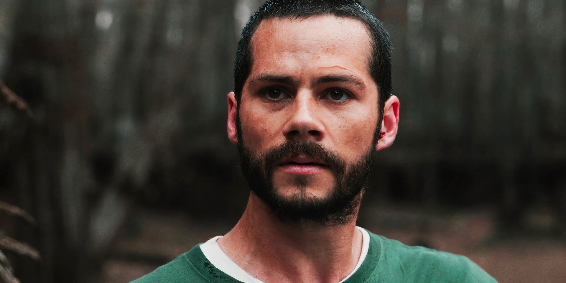 Dylan O'Brien looking stunned in a scene from from Caddo Lake Image