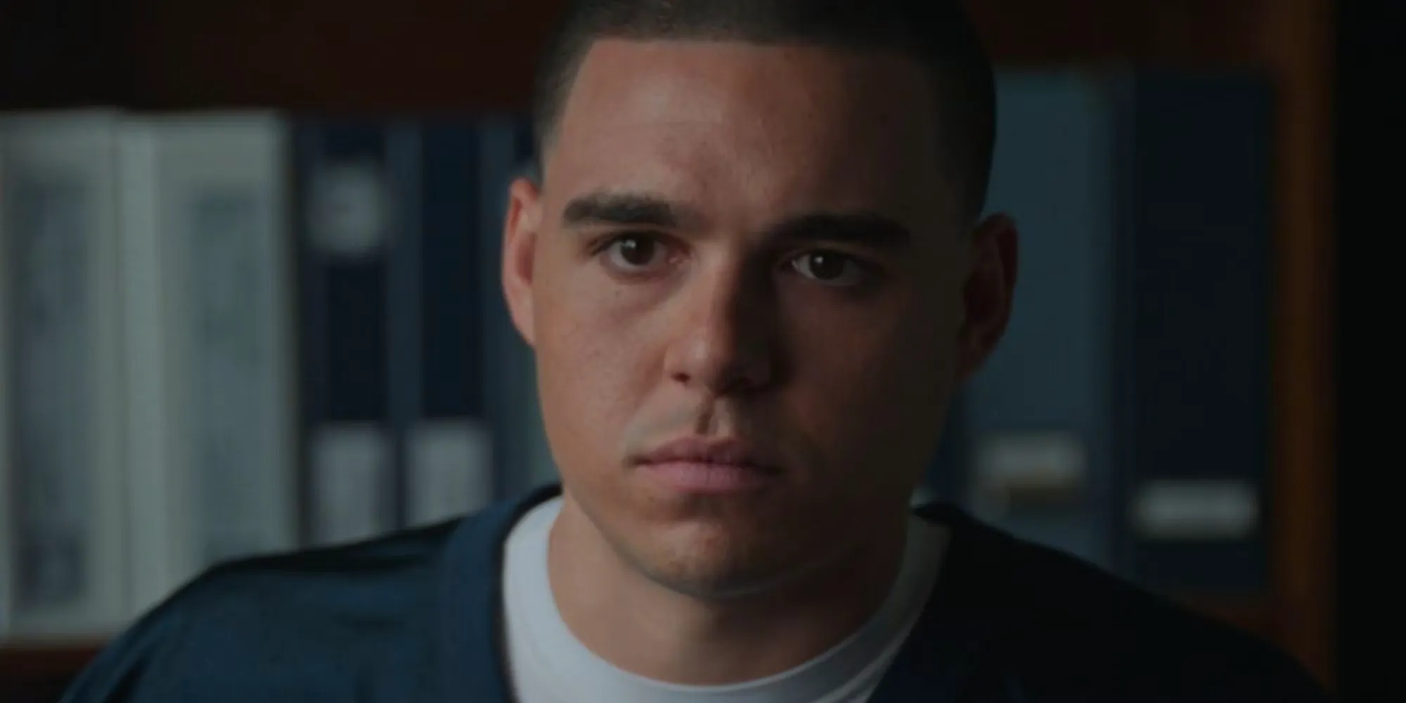 Ean Castellanos as DJ Hernandez looking sad in American Sports Story Image