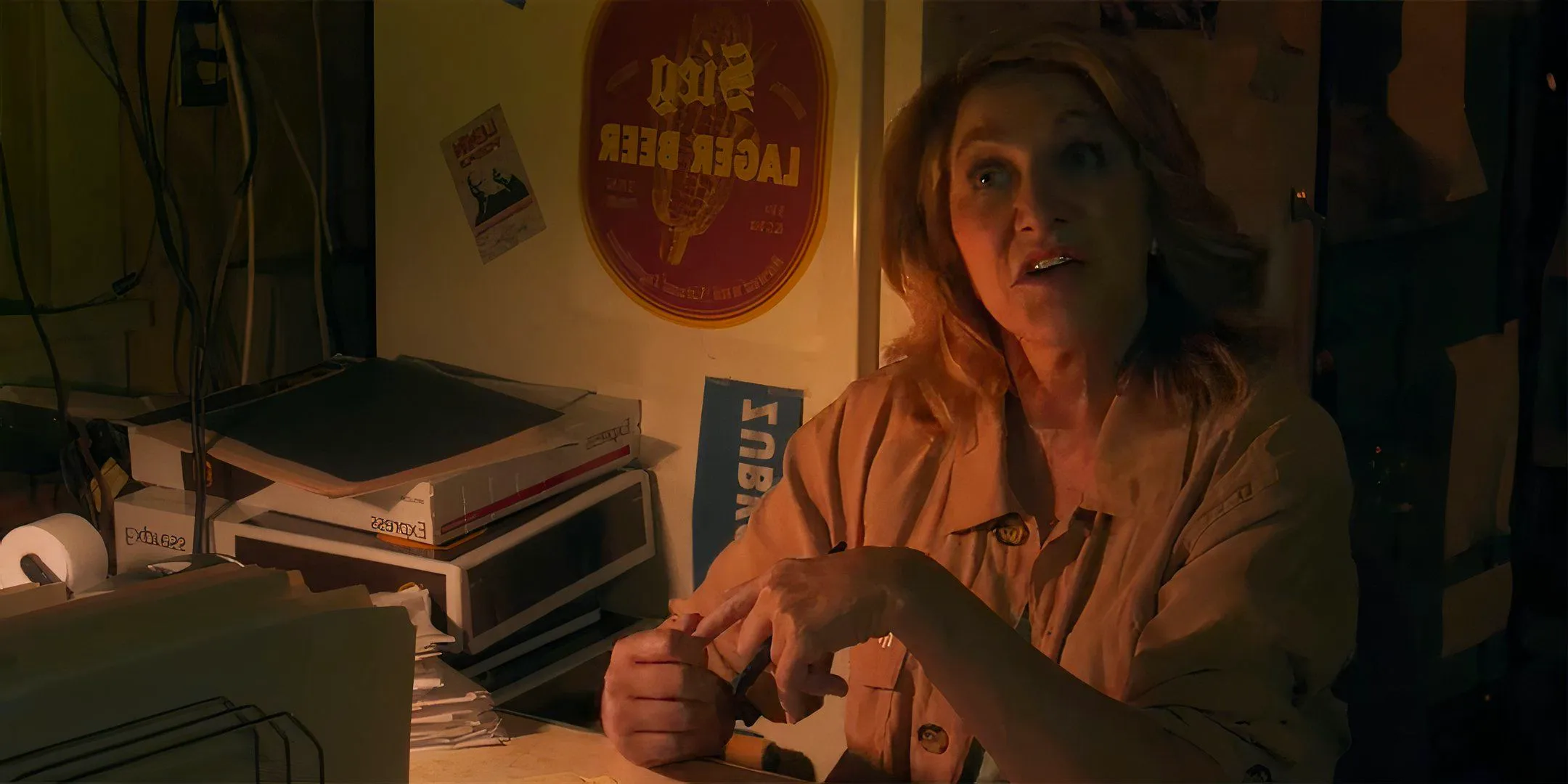 Edie Falco as Wanda looking quizzically at someone in I'll Be Right There Image