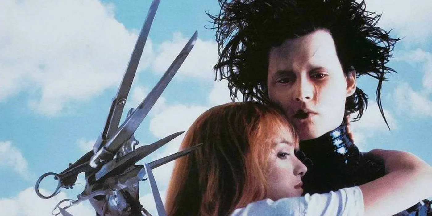 Edward looks remorseful and Kim looks contemplative in a promotional still for Edward Scissorhands Image