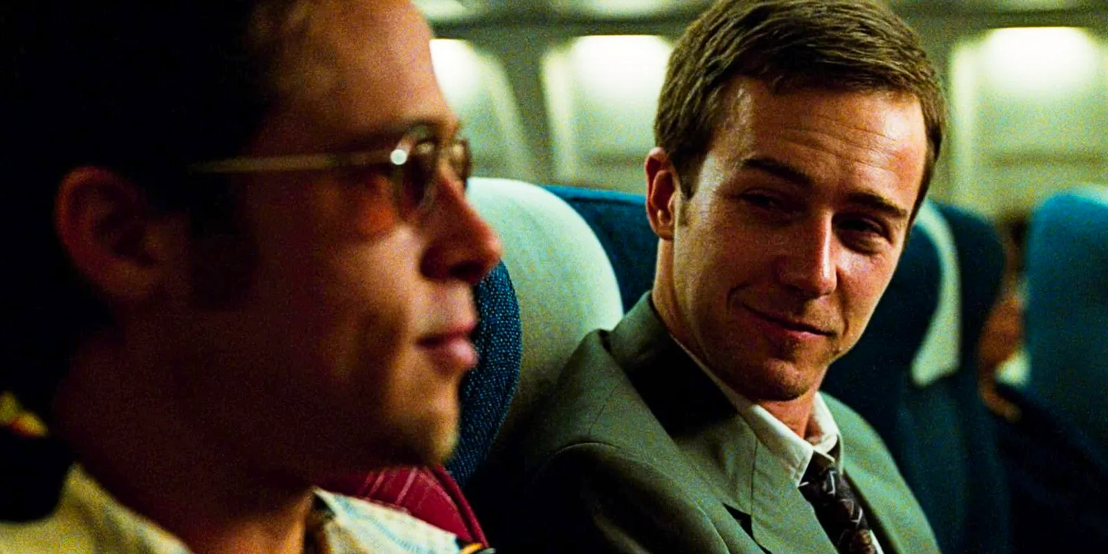 Edward Norton as the Unnamed Protagonist meeting Brad Pitt as Tyler Durden in an airplane in Fight Club Image