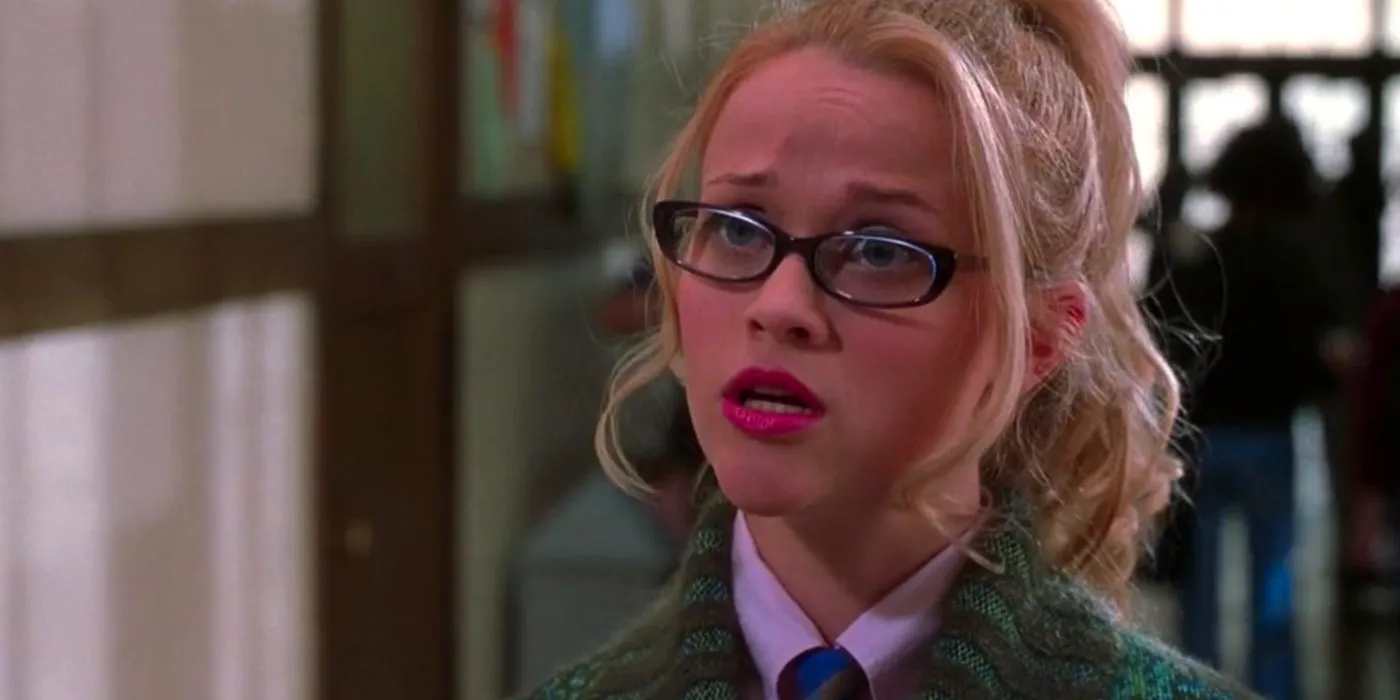 Elle Woods looking shocked in the hallway at Harvard University in Legally Blonde. Image