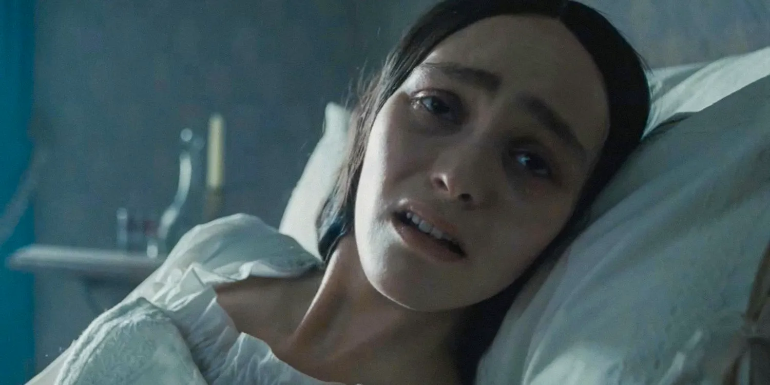 Ellen Hutter (Lily-Rose Depp) in bed looking sick in Nosferatu Image