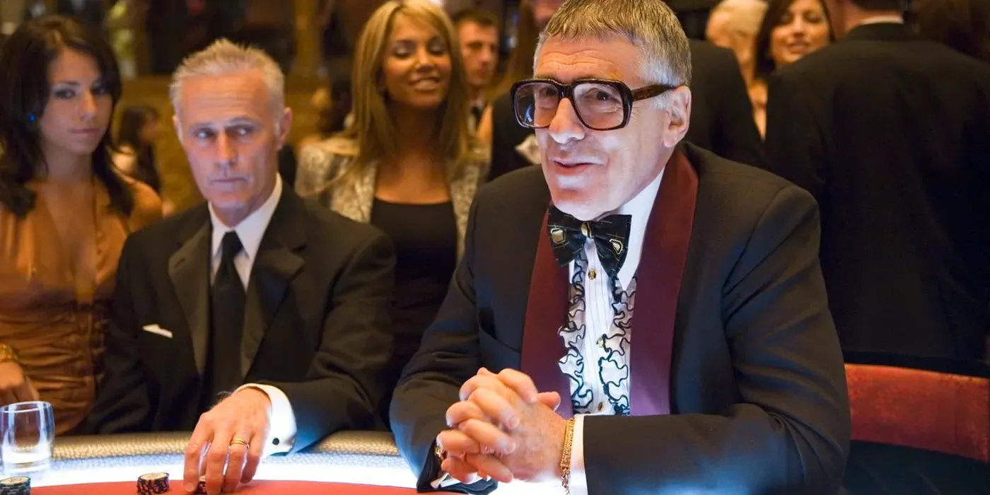 Elliott Gould as Reuben Tishkoff sits at a table in a Vegas casino in Ocean's Eleven Image