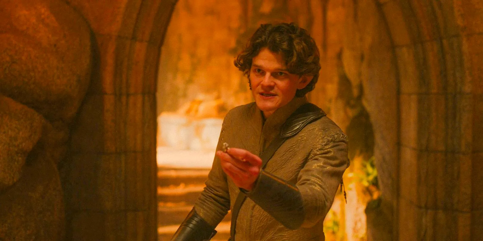 Elrond (Robert Aramayo) gives Galadriel's ring to the High King in The Lord of the Rings: The Rings of Power Season 2 Episode 5 Image