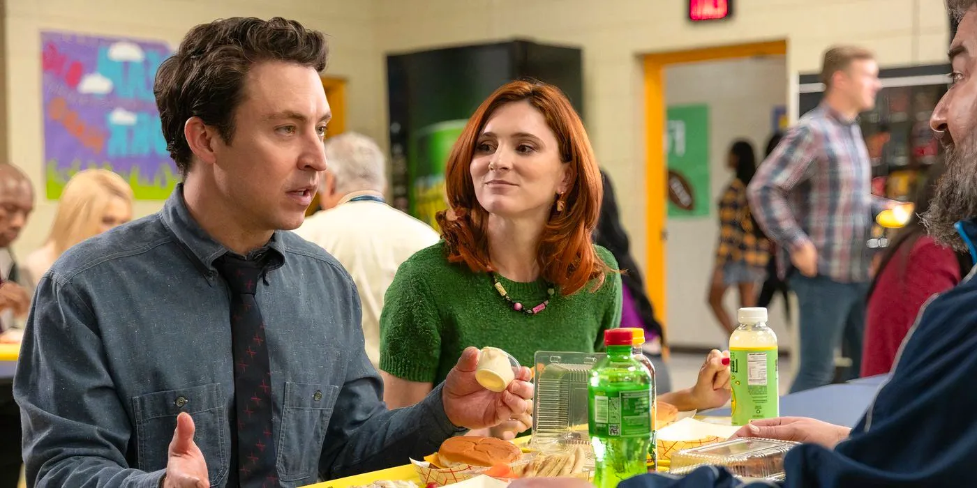 Evan explains something while Gwen and Markie listen at the lunch table in English Teacher Image