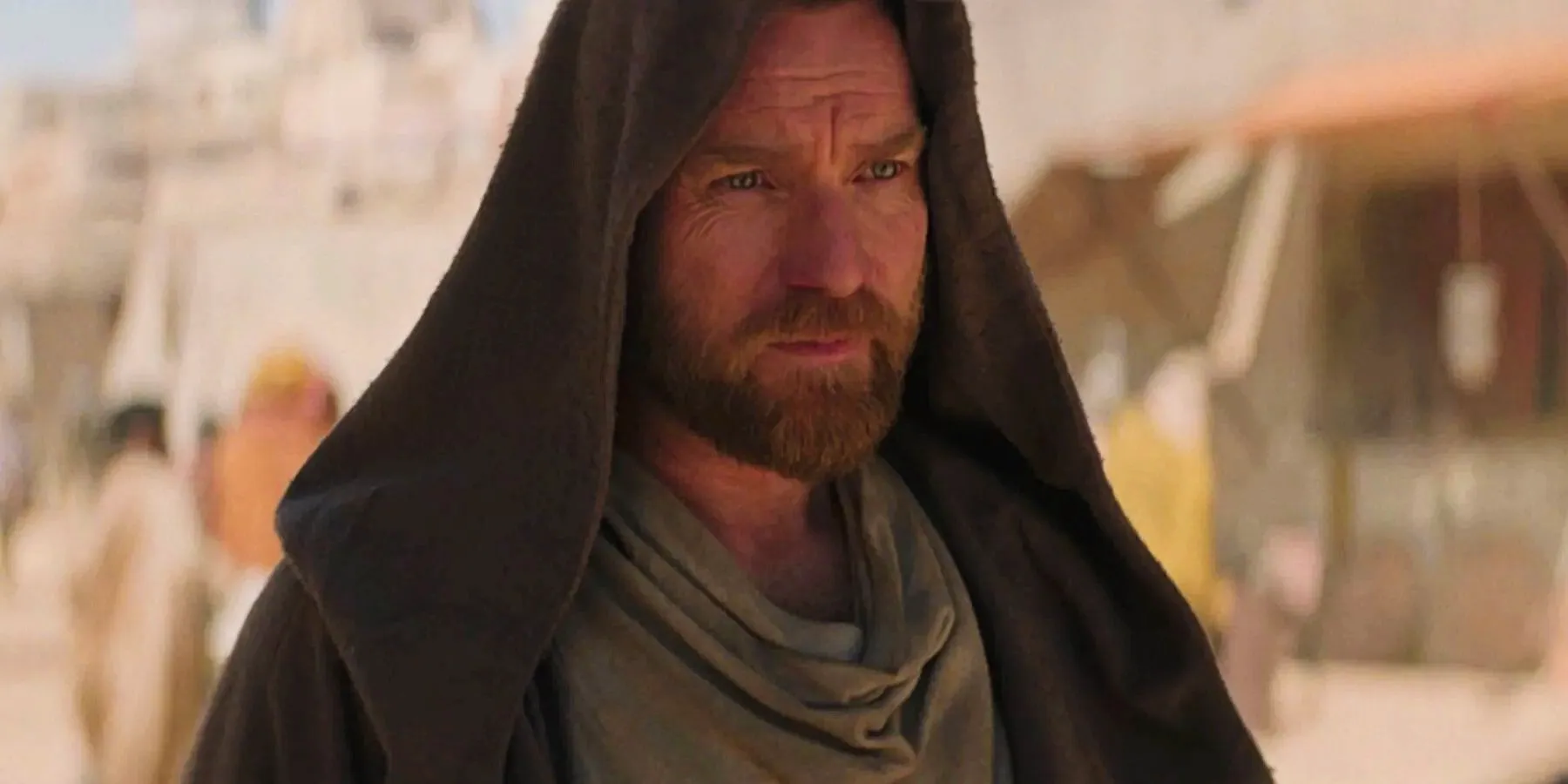 Ewan McGregor looking serious with his hood raised in the Obi-Wan Kenobi series on Disney Plus. Image