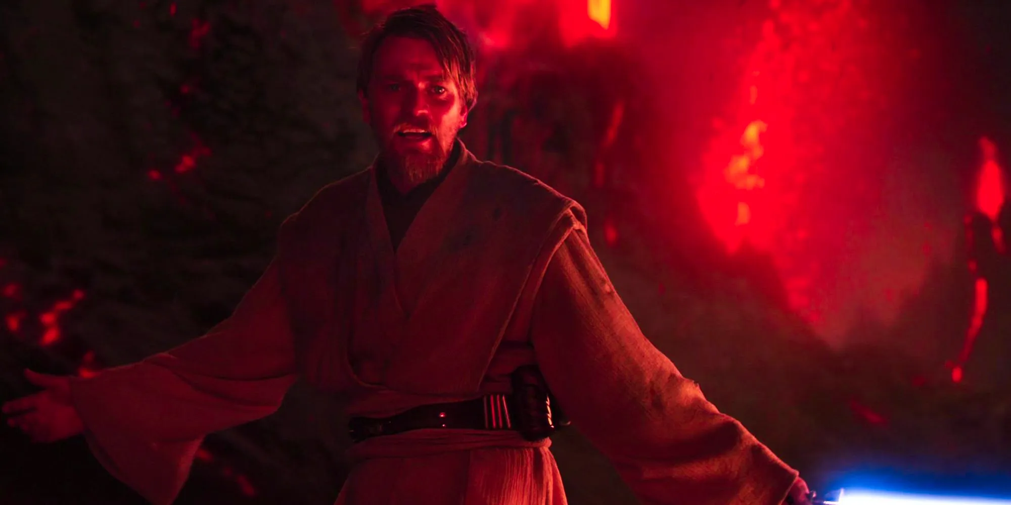 Ewan McGregor's Obi-Wan Kenobi announces to Anakin that he has the high ground on Mustafar, holding his lightsaber and his hand out Image