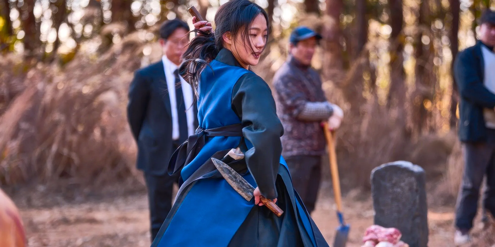 Exhuma's Lee Hwa-rim performs a ritual. Image