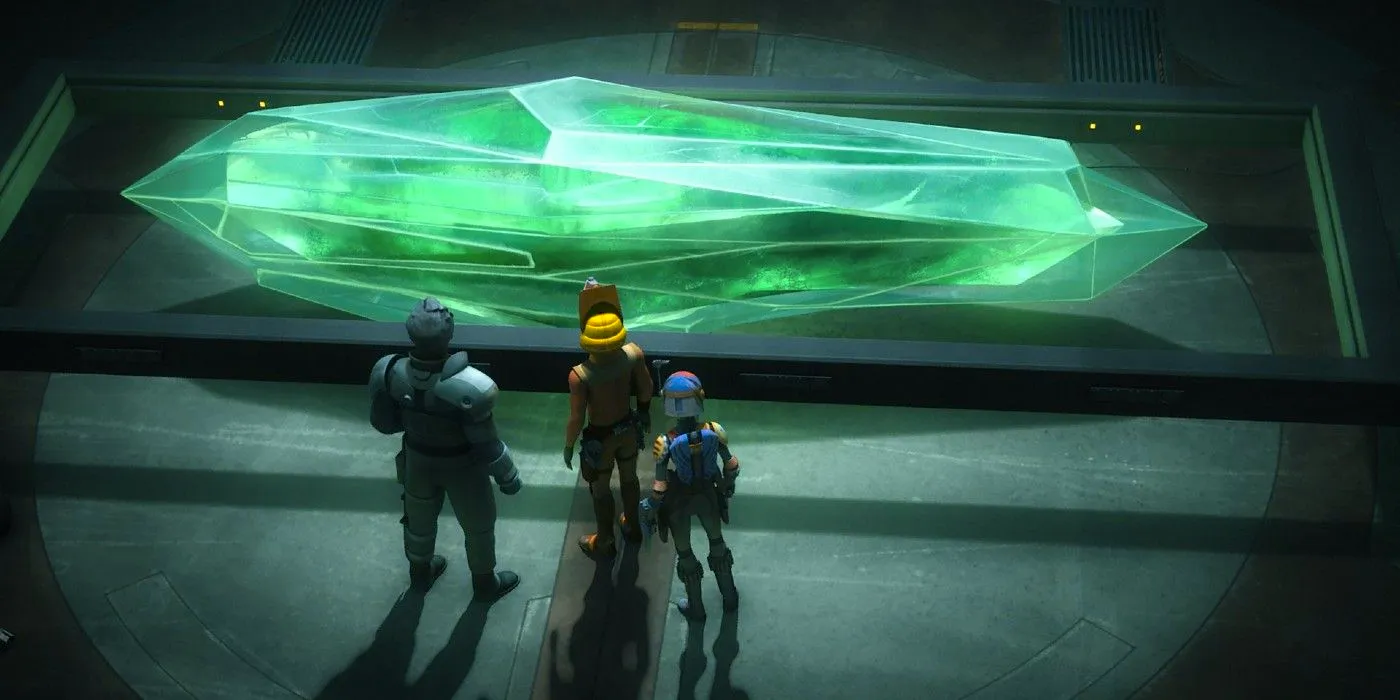 Ezra Bridger and Sabine Wren look upon a massive green kyber crystal Image