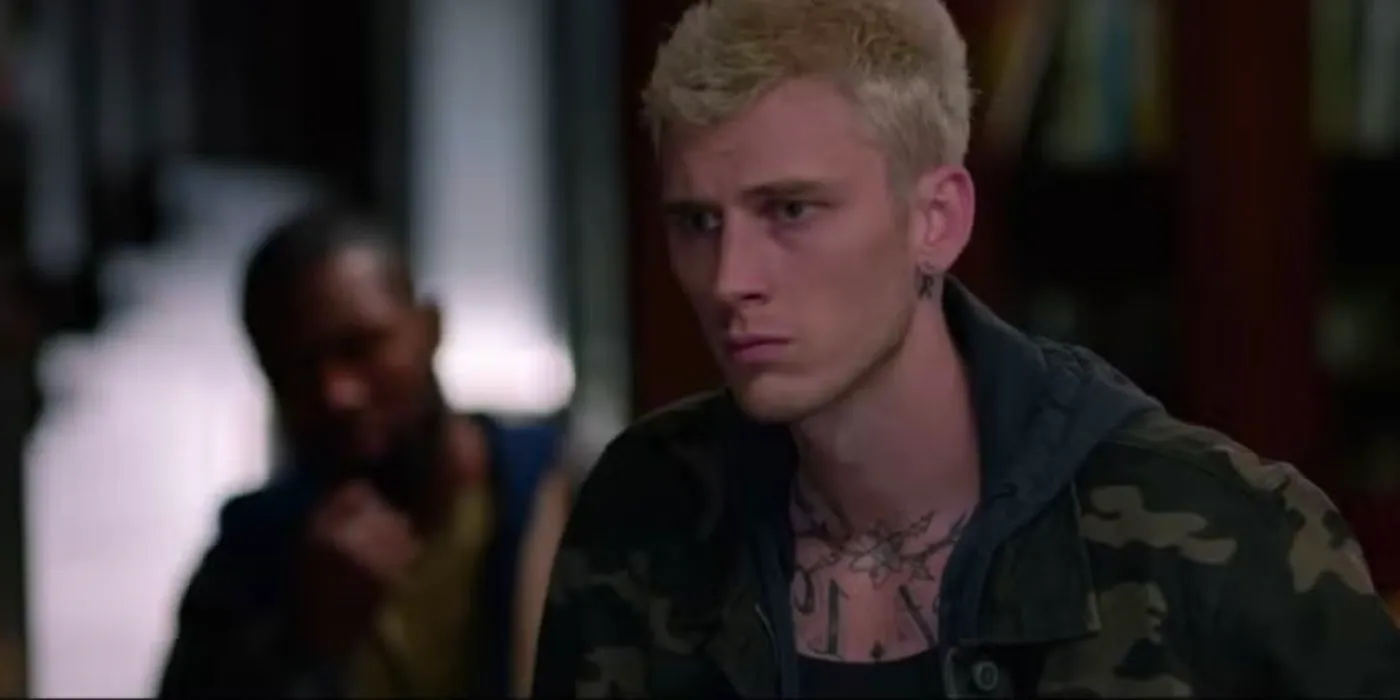 Felix (Machine Gun Kelly) staring at something in Bird Box. Image