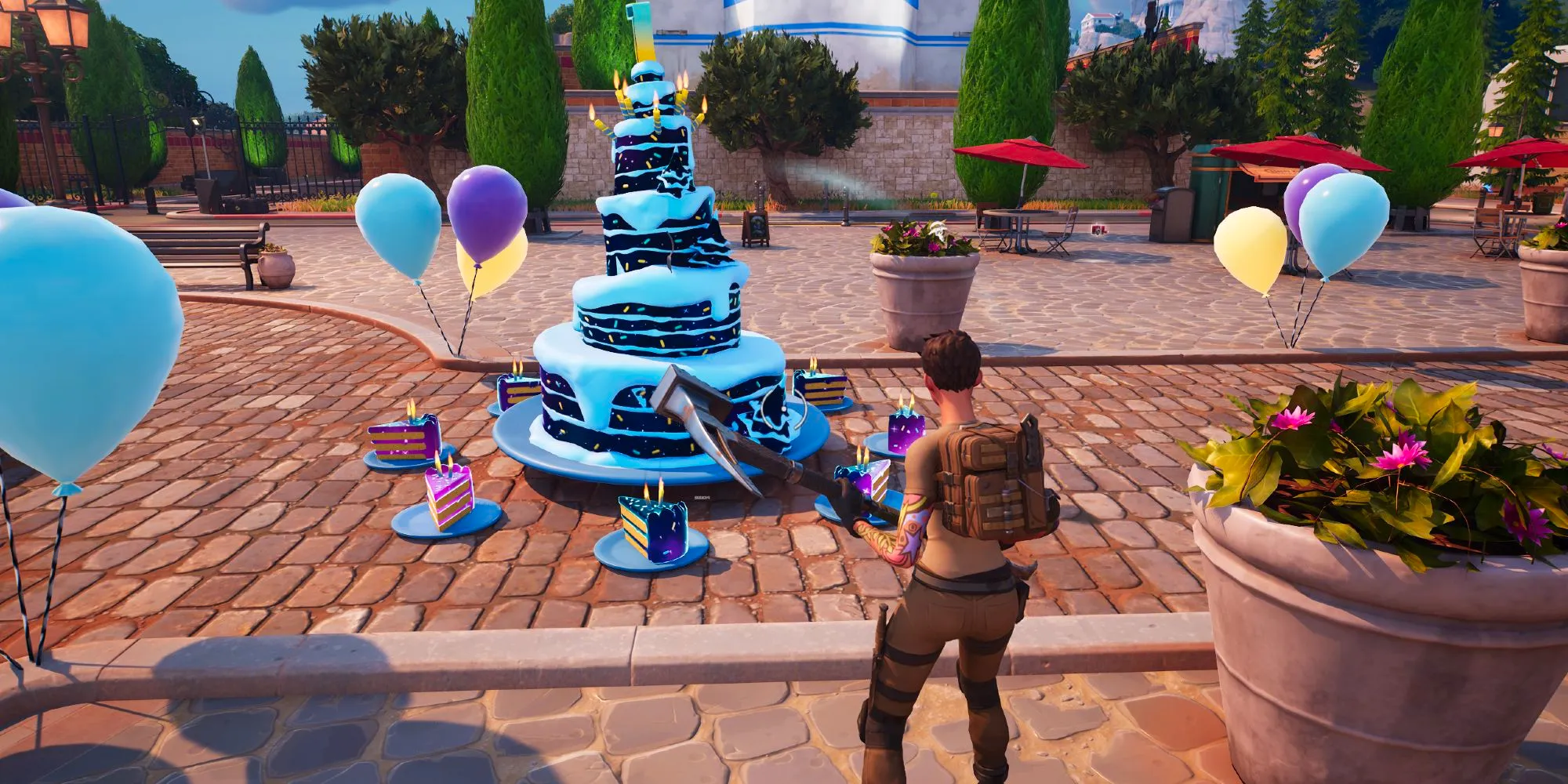 Female Character Standing Close To Fortnite 7th Anniversary Birthday Cake Surrounded By Cake Slices And Yellow, Blue And Purple Balloons In Reckless Railways Image