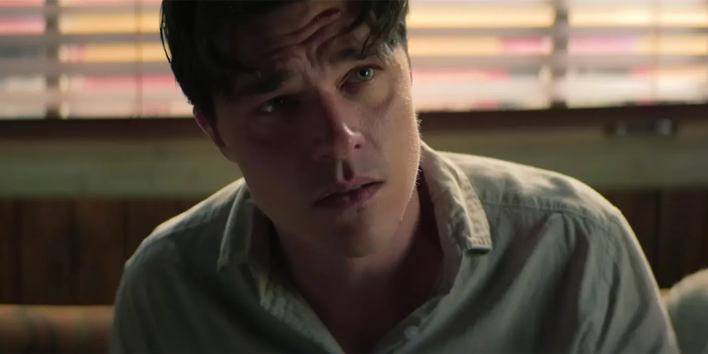 Finn Wittrock sitting in an office in Don't Move Image