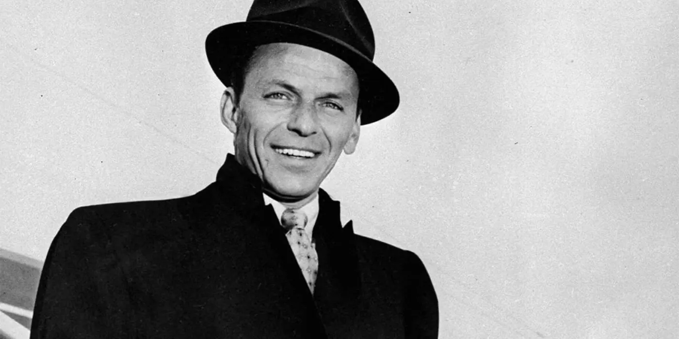 Frank Sinatra smiling at the camera in a picture  Image