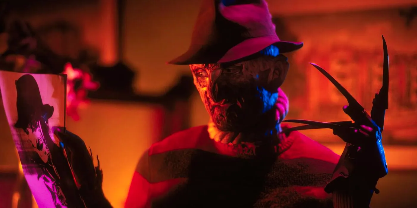 Freddy Krueger holding up a picture of himself in Freddy's Nightmares Image