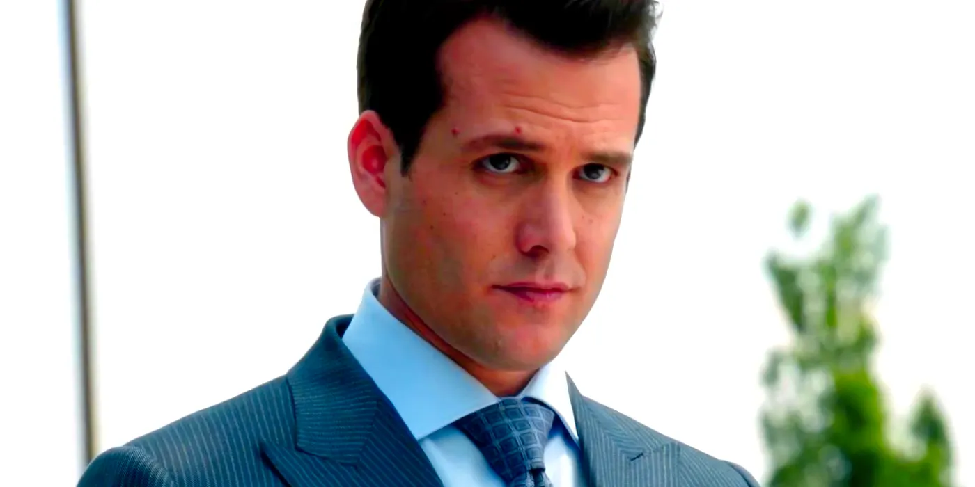 Gabriel Macht as Harvey Specter looking at someone with his head slightly tilted in Suits Season 1 Image