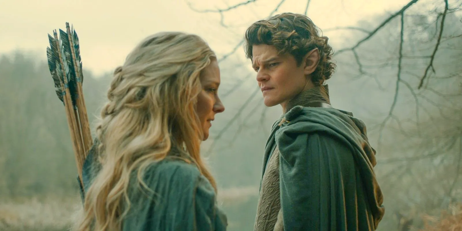 Galadriel (Morfydd Clark) tells Elrond (Robert Aramayo) about the visions caused by the power of the ring in The Lord of the Rings: The Rings of Power Image