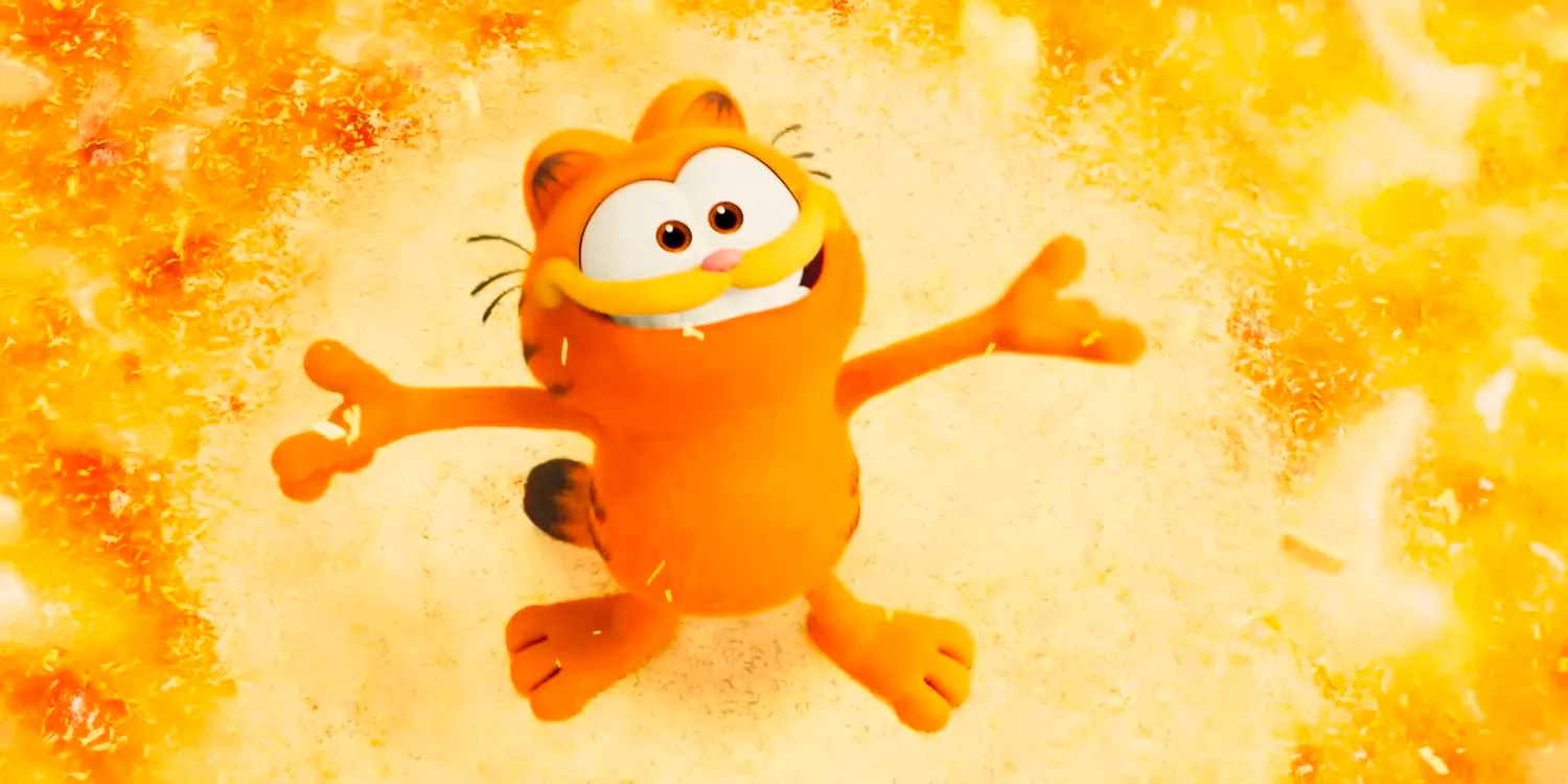 Garfield, happy standing on a lasagna and under a shower of Parmesan cheese in The Garfield Movie (2024) Image