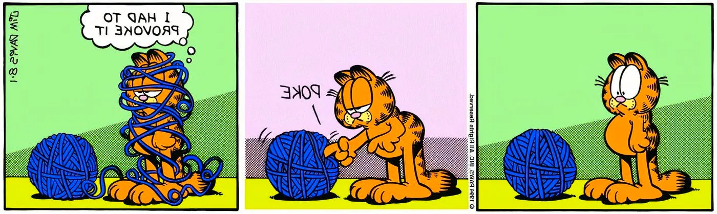 Garfield playing with a ball of yarn. Image