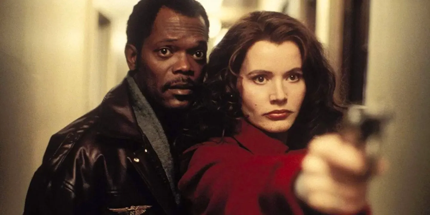 Geena Davis and Samuel L. Jackson in a hallway in The Long Kiss Goodnight. Image