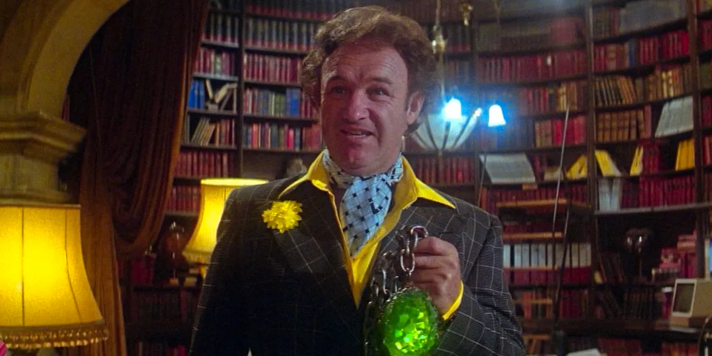 Gene Hackman as Lex Luthor holding up a piece of kryptonite in Superman (1978) Image