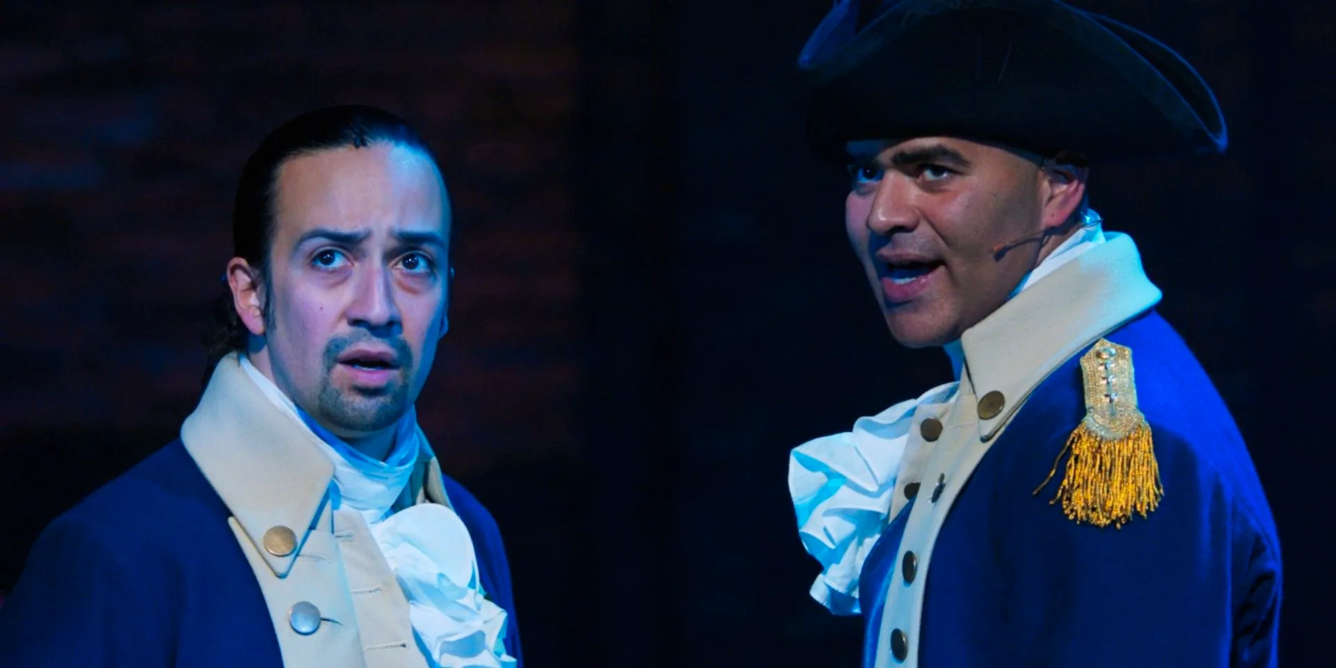 George Washington and Alexander Hamilton look out on the audience in Hamilton Image