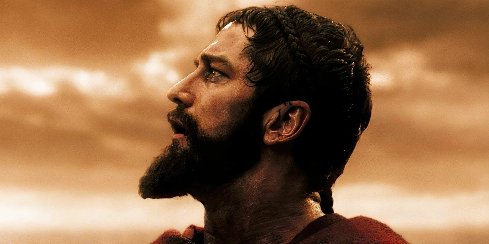 Gerard Butler looking to the sky as King Leonidas in 300 Image