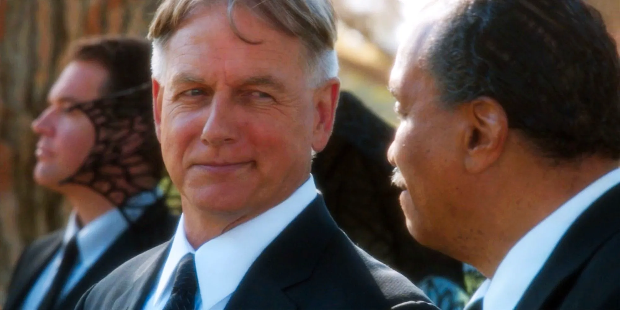 Gibbs smiling at a funeral in NCIS Image