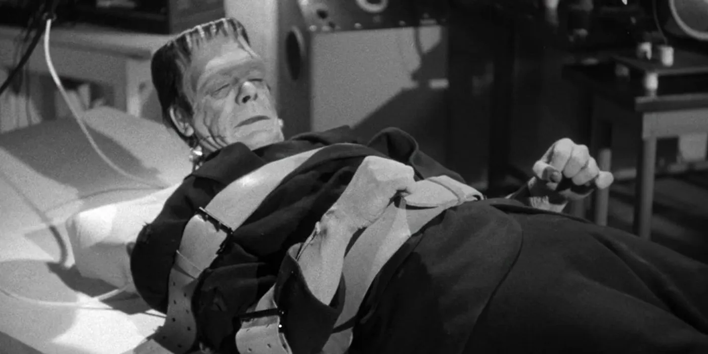 Glenn Strange as Frankstein's monster strapped to a table in Abbott & Costello Meet Frankenstein Image