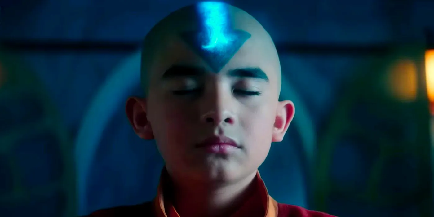 Gordon Cormier as Aang Closing His Eyes with a Glowing Arrow Tattoo in the Live-Action Avatar: The Last Airbender Image