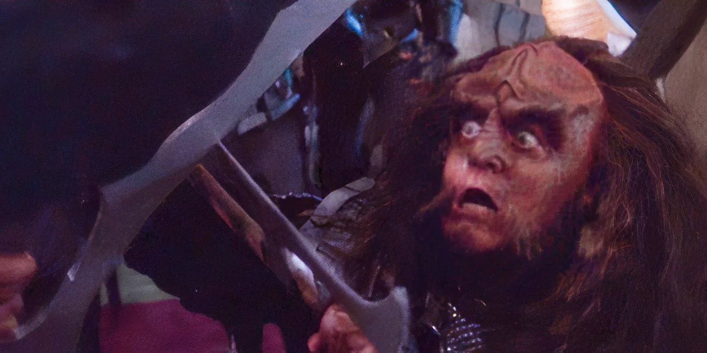 Gowron looks terrified while he and Worf duel in the Star Trek: DS9 episode 