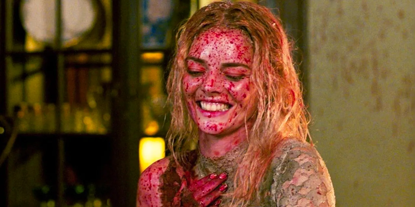 Grace Le Domas (Samara Weaving) smiling whilst covered in blood in Ready or Not Image