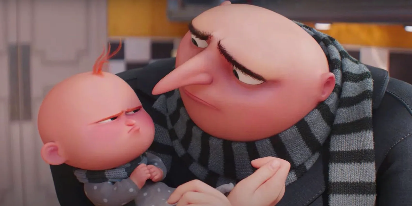 Gru holding his son, who is pouting, in Despicable Me 4 trailer Image