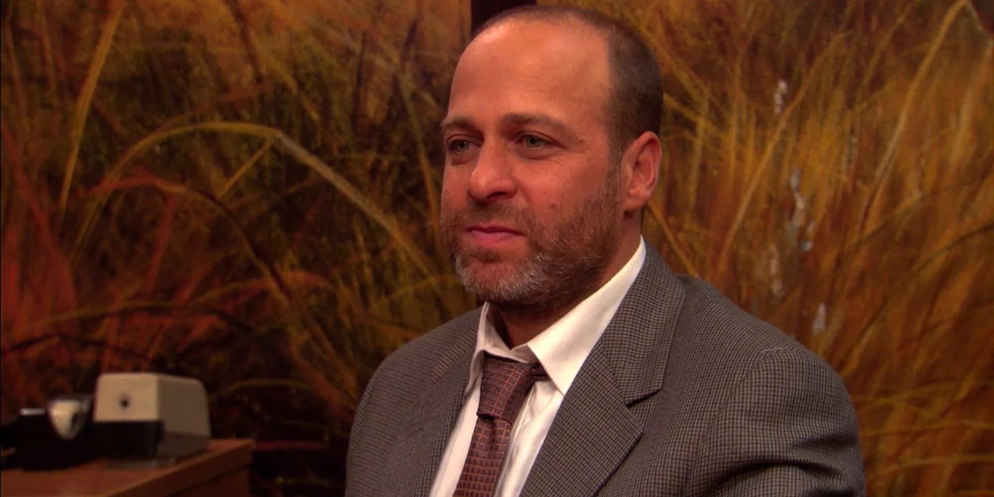 H Jon Benjamin in the conference room in Parks and Recreation Image