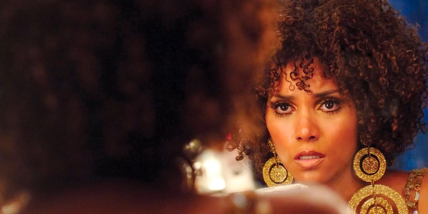 Halle Berry in Frankie and Alice, Halle is staring in the mirror looking haunted  Image