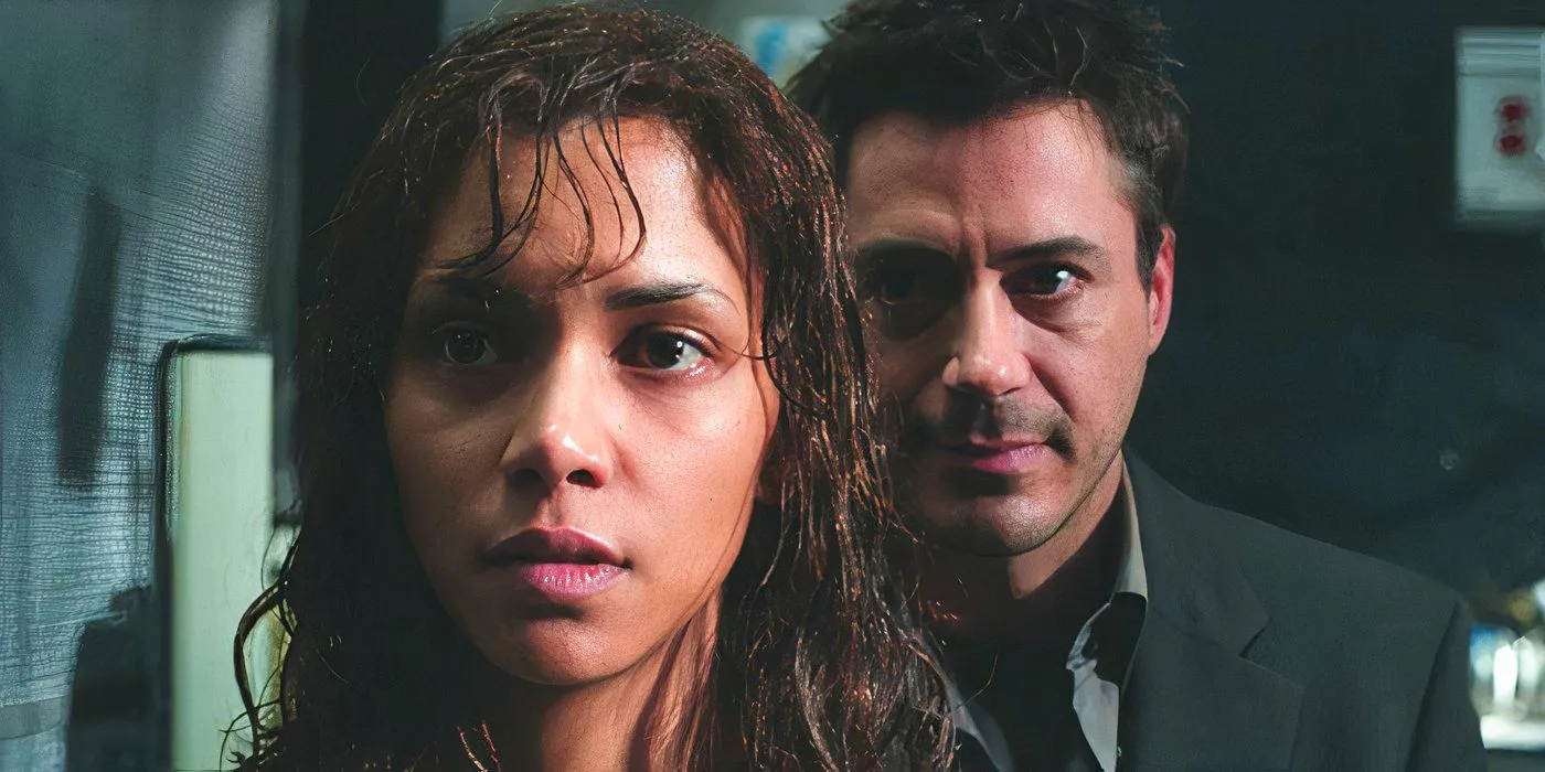 Halle Berry In gothika, Dr Miranda Grey and Robert Downey Jrs character, Halle looks dishevelled and confused  Image