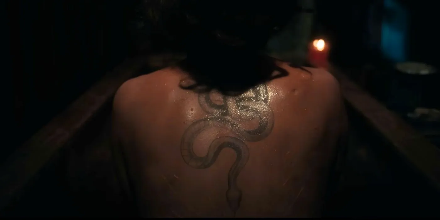 Halle Berry's Momma's snake tattoo in Never Let Go Image