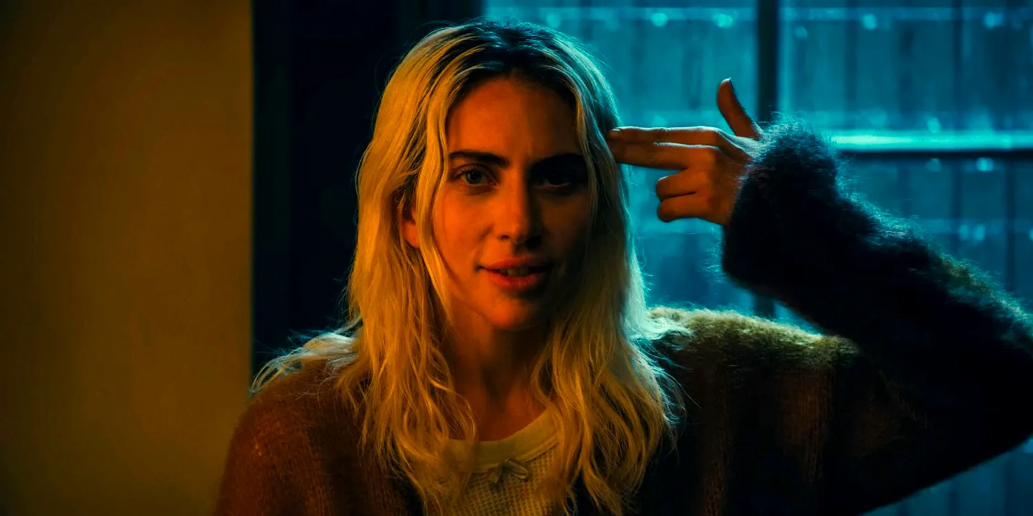 Harley Quinn (Lady Gaga) makes a gun gesture with her hand and puts it to her head in Joker: Folie à Deux Image