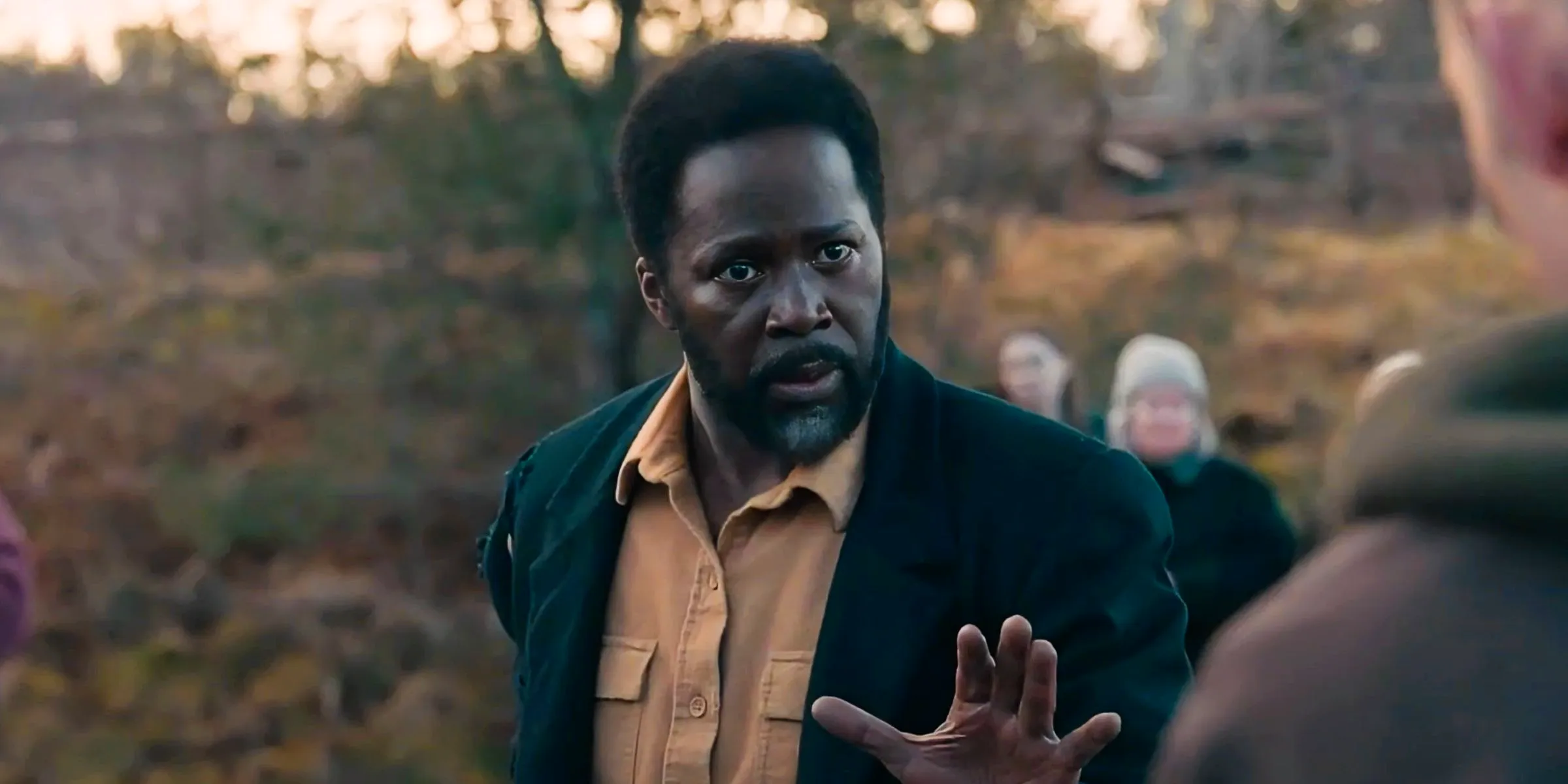 Harold Perrineau as Boyd cautiously holding his hands up in From season 3 Image