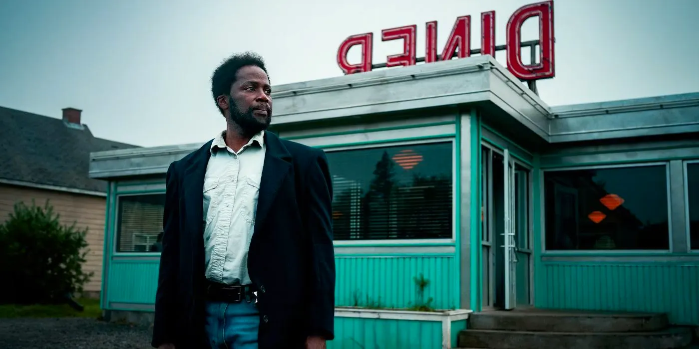 Harold Perrineau as Boyd Stevens in front of a diner in From. Image